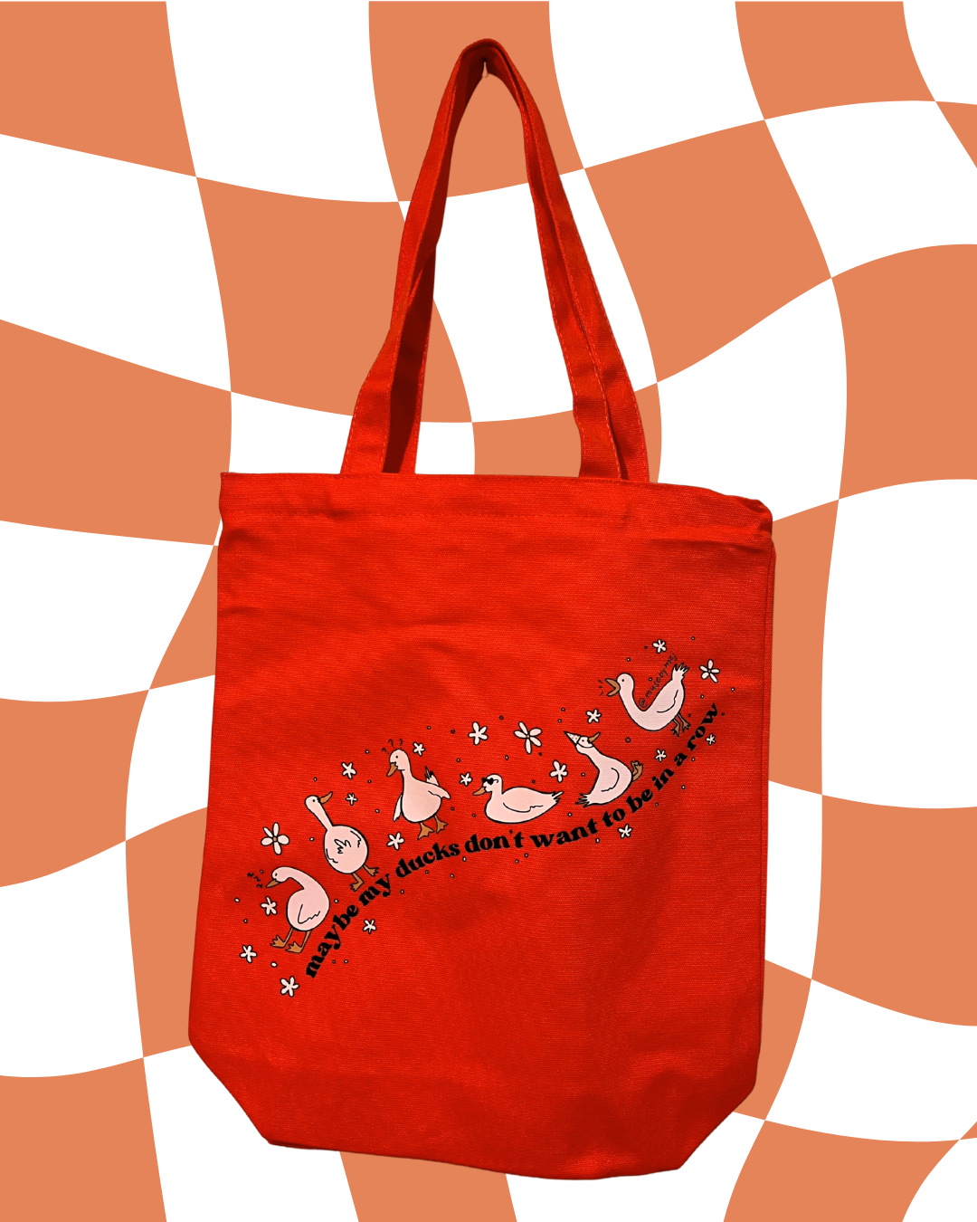 maybe my ducks don't want to be in a row tote bags
