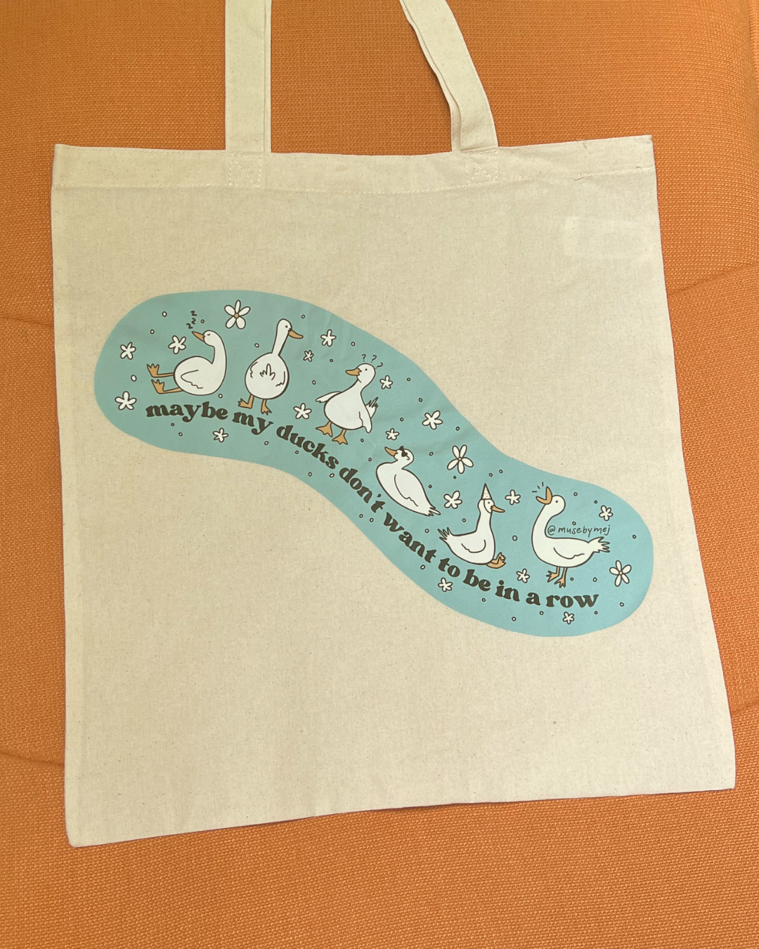 maybe my ducks don't want to be in a row tote bag