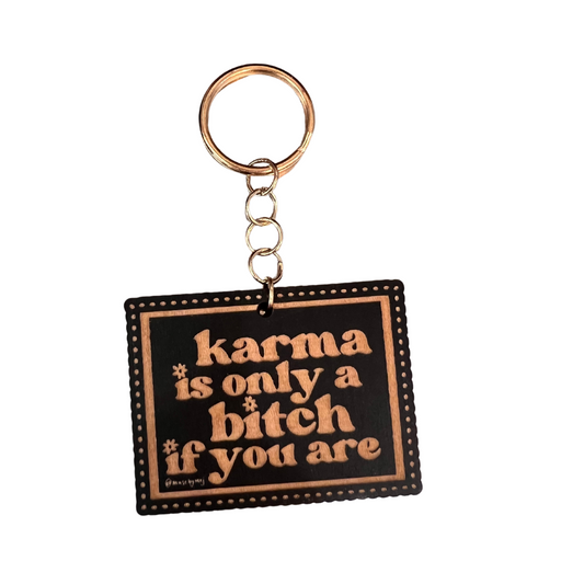 karma's only a bitch if you are wooden keychain