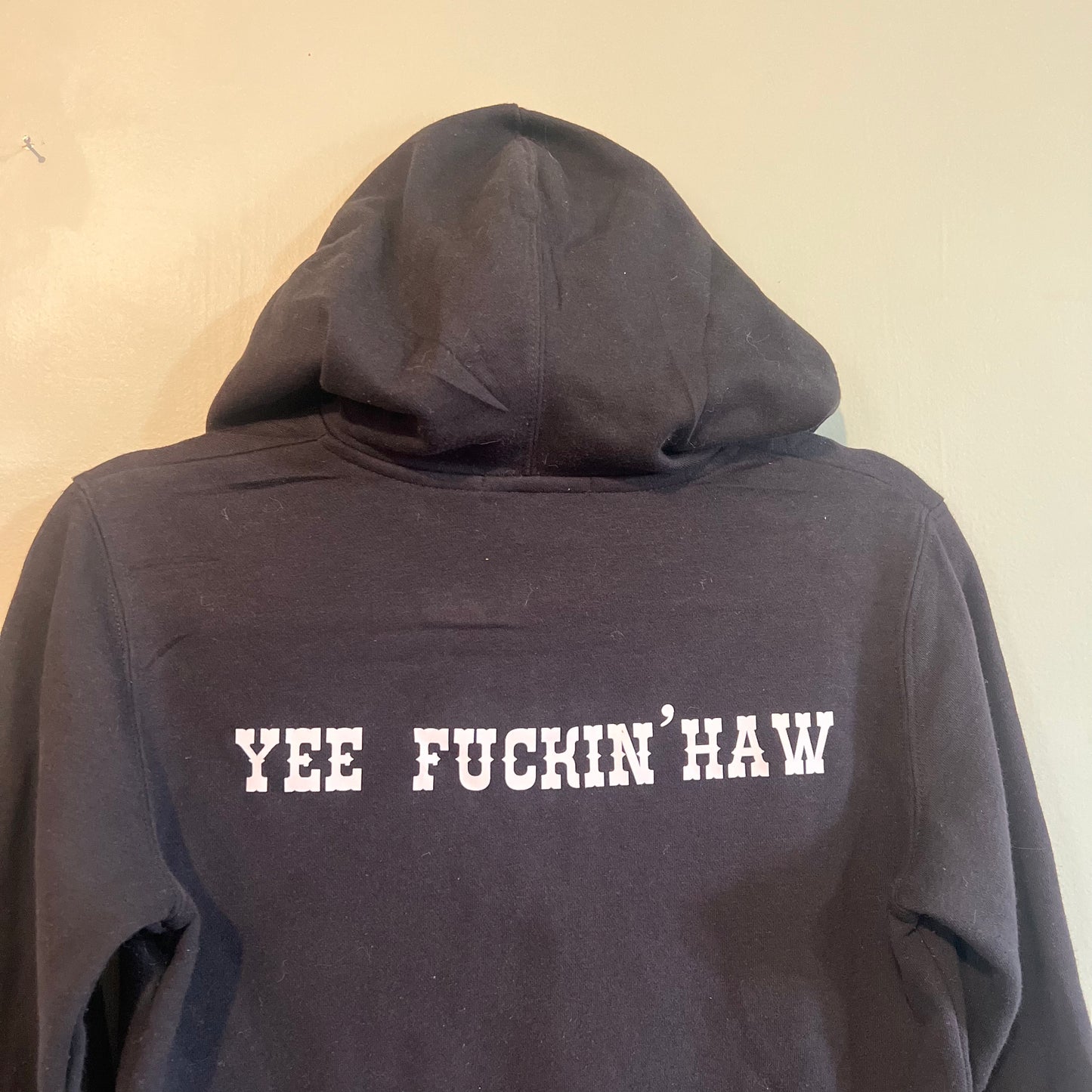 "yee fuckin haw" black hoodie (size S)