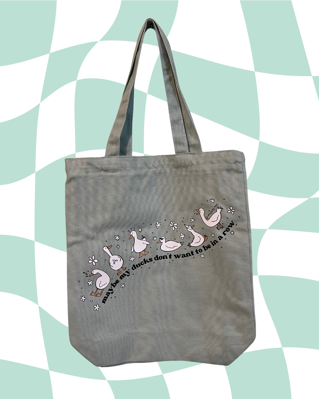 maybe my ducks don't want to be in a row tote bags